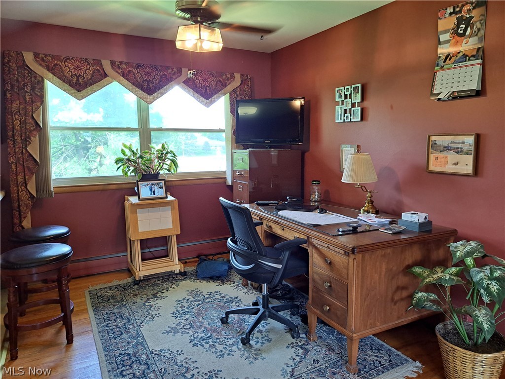 3905 Mark Road Cambridge, OH 43725 - Photo 18 of 50 Home office/breakfast room/sunroom with hardwood flooring