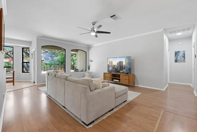 a living room with furniture and a window