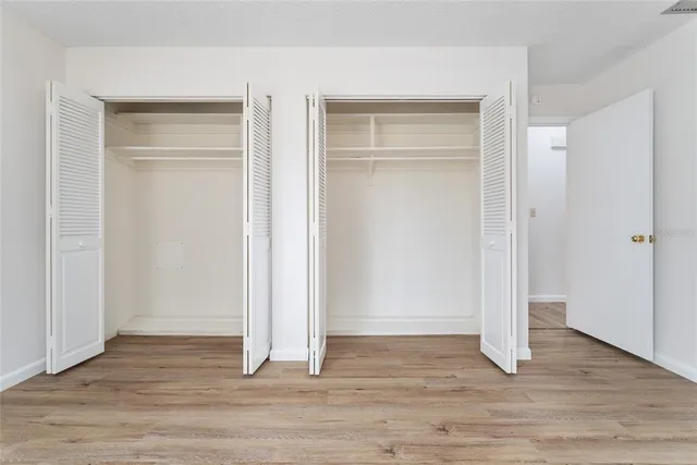 a bathroom with a sink a vanity and a bathtub