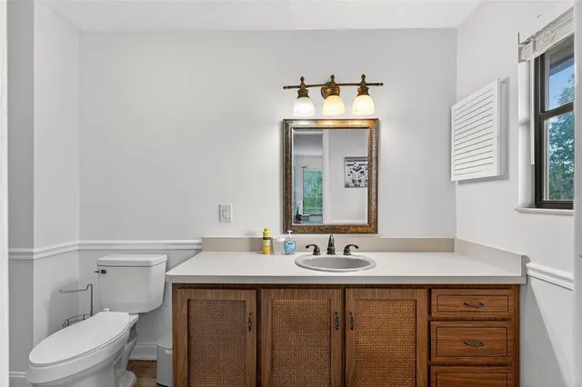 a bedroom with a bed and a walk in closet