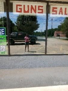 3390 South New Hope Road Gastonia, NC 28056 - Photo 16 of 26 a man walking down a street