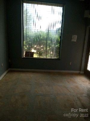 3390 South New Hope Road Gastonia, NC 28056 - Photo 24 of 26 a view of an empty room with a window