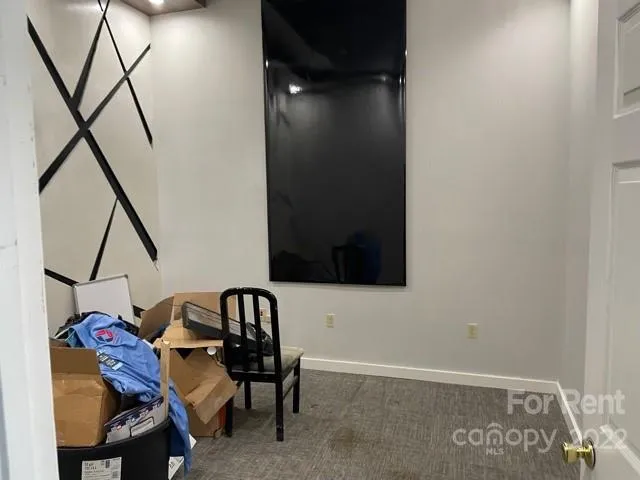 a bathroom with a toilet and a sink