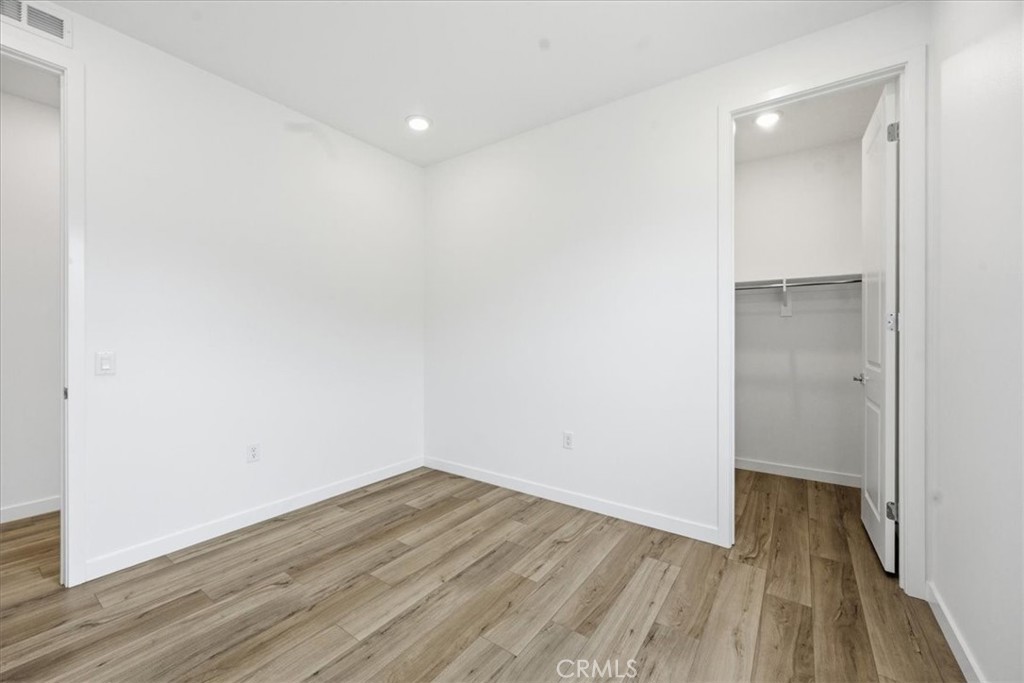 42957 56th Street West Lancaster, CA 93536 - Photo 17 of 40 a view of small space with wooden floor