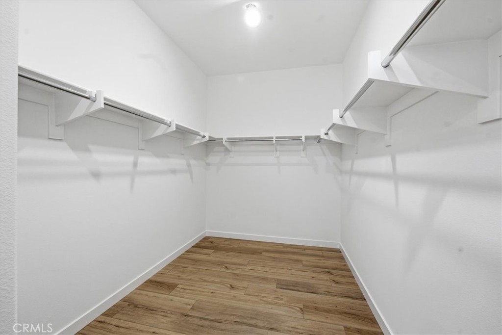 42957 56th Street West Lancaster, CA 93536 - Photo 25 of 40 a view of a room with racks on the wall