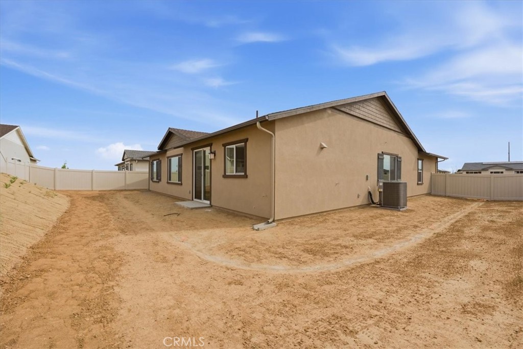 42957 56th Street West Lancaster, CA 93536 - Photo 30 of 40 a view of a house with backyard