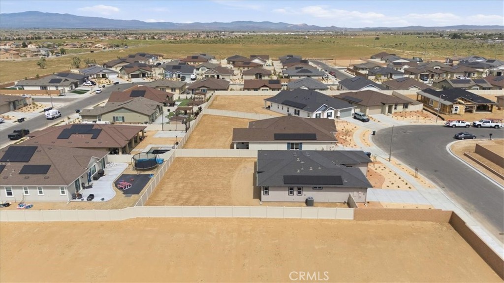 42957 56th Street West Lancaster, CA 93536 - Photo 37 of 40 an aerial view of residential houses with outdoor space