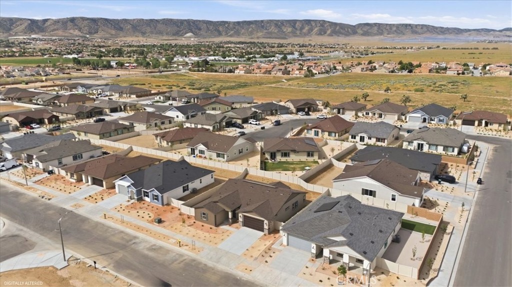 42957 56th Street West Lancaster, CA 93536 - Photo 39 of 40 an aerial view of a city with lots of residential buildings