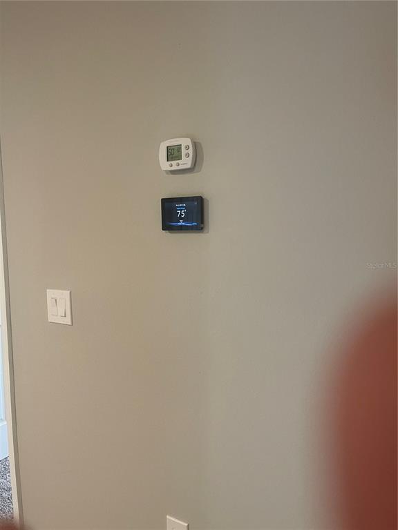 452 Legacy Loop Davenport, FL 33896 - Photo 12 of 29 a view of a wall with a white wall