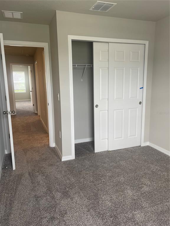 452 Legacy Loop Davenport, FL 33896 - Photo 17 of 29 a view of an empty room