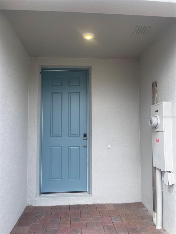 452 Legacy Loop Davenport, FL 33896 - Photo 3 of 29 a view of empty room