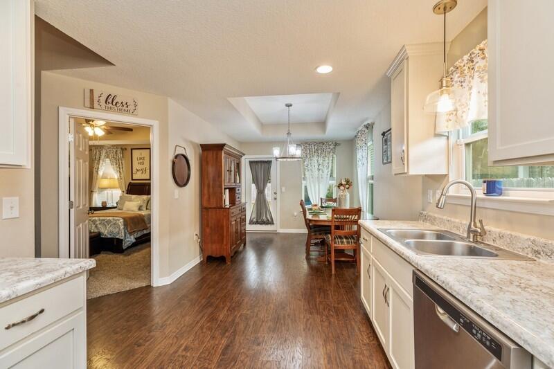 3152 Vaccari Court Crestview, FL 32539 - Photo 14 of 36 a kitchen with lots of counter top space and wooden floor