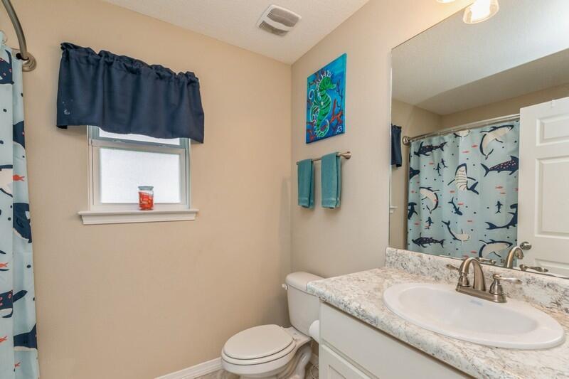 3152 Vaccari Court Crestview, FL 32539 - Photo 29 of 36 a bathroom with a sink toilet and shower