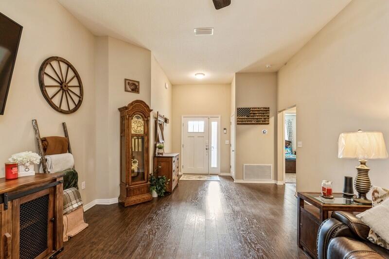 3152 Vaccari Court Crestview, FL 32539 - Photo 8 of 36 a view of a livingroom with furniture and wooden floor