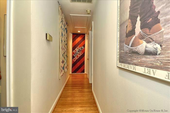 2107 Seminary Road Silver Spring, MD 20910 - Photo 13 of 30 HARDWOOD FLOORS IN HALLWAY TO BEDROOMS