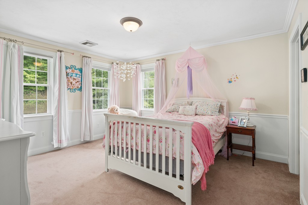 36 Draper Woods Road Sturbridge, MA 01518 - Photo 12 of 25 a bedroom with a bed and a window