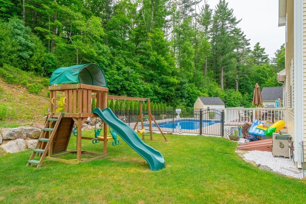 36 Draper Woods Road Sturbridge, MA 01518 - Photo 23 of 25 a view of a slide with a slide