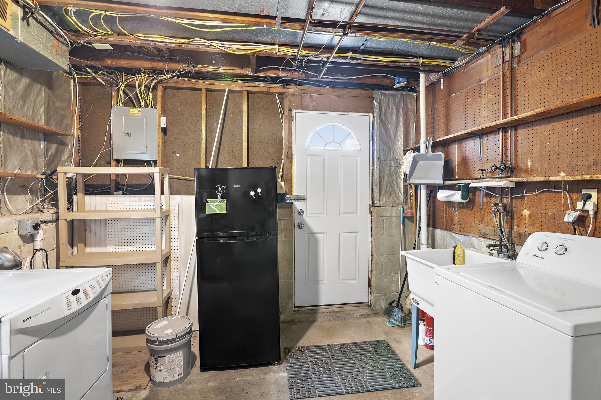 9004 Tammy Road Baltimore, MD 21236 - Photo 23 of 27 Functional utility space with storage.