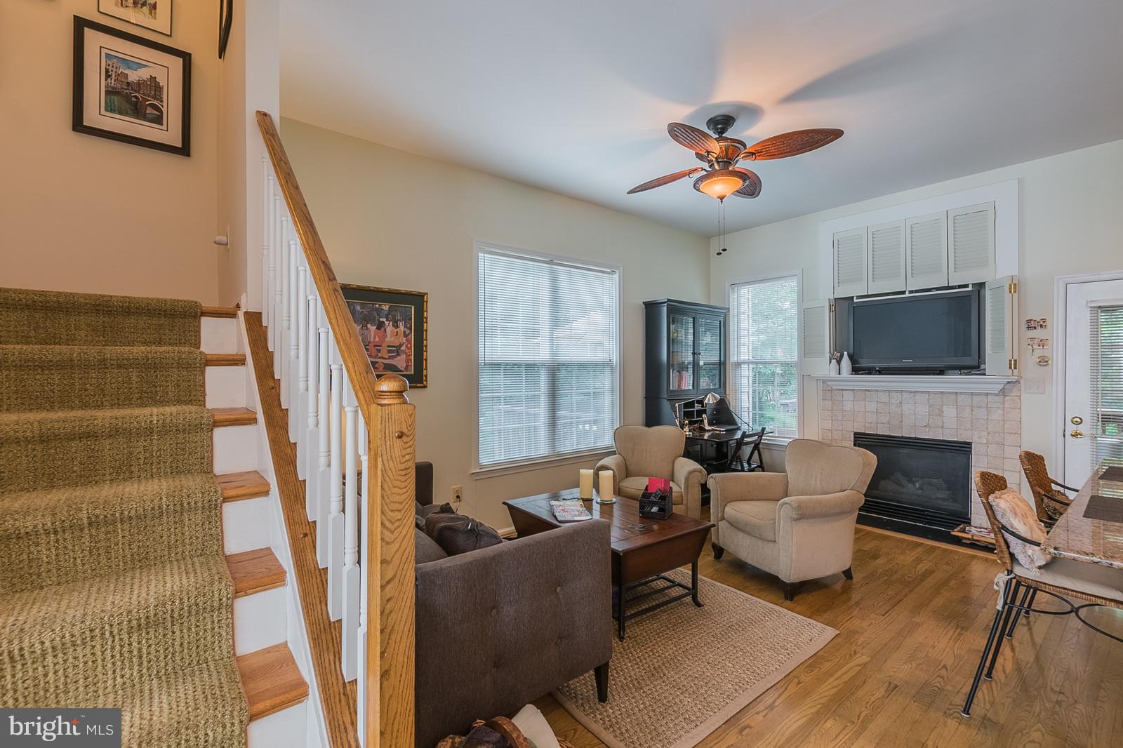 20672 Riptide Square Sterling, VA 20165 - Photo 12 of 30 Family Room w/ Gas Fireplace off the Kitchen