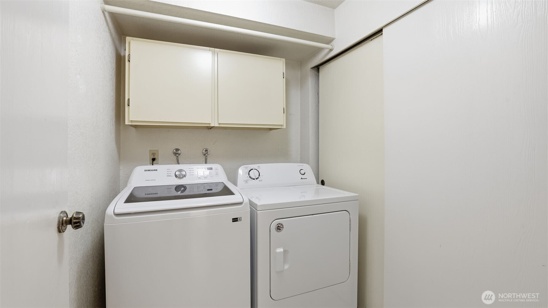 1850 Grant Avenue South, Unit D5 Renton, WA 98055 - Photo 25 of 25 a utility room with dryer and washer