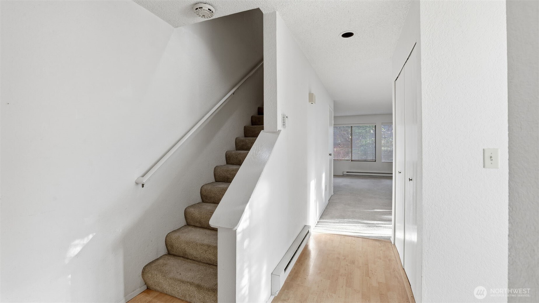 1850 Grant Avenue South, Unit D5 Renton, WA 98055 - Photo 4 of 25 a view of entryway and hall with wooden floor