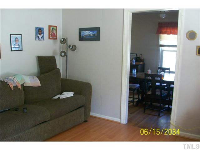 Hardwood floors in this room and dining room Living Room