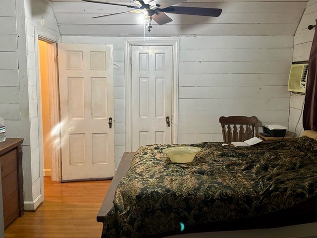 2320 Rusk Street Beaumont, TX 77702 - Photo 7 of 8 a bedroom with a bed and a window