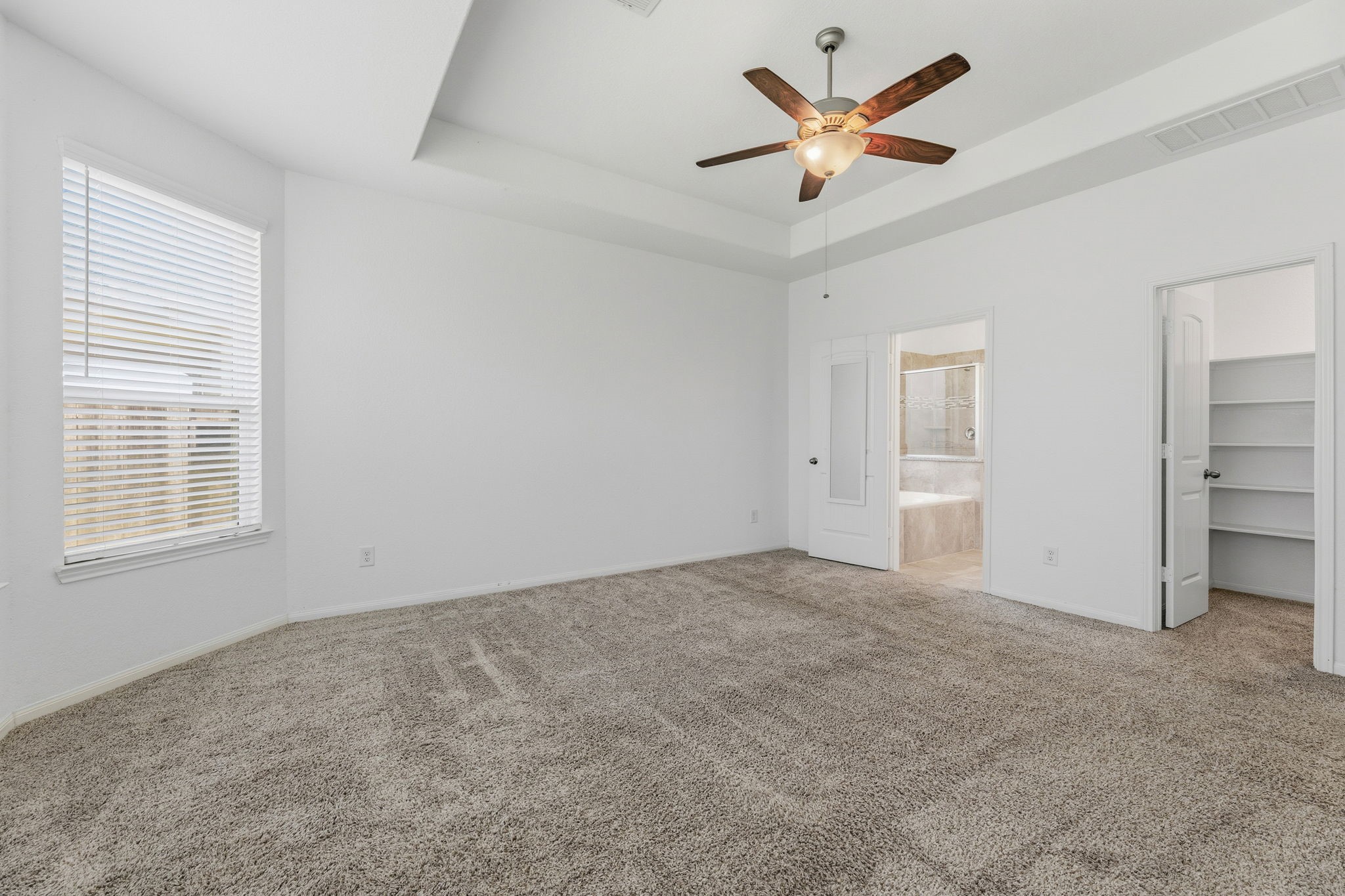 17515 Harbourfront Road Humble, TX 77346 - Photo 17 of 36 Primary Suite with Tray Ceiling