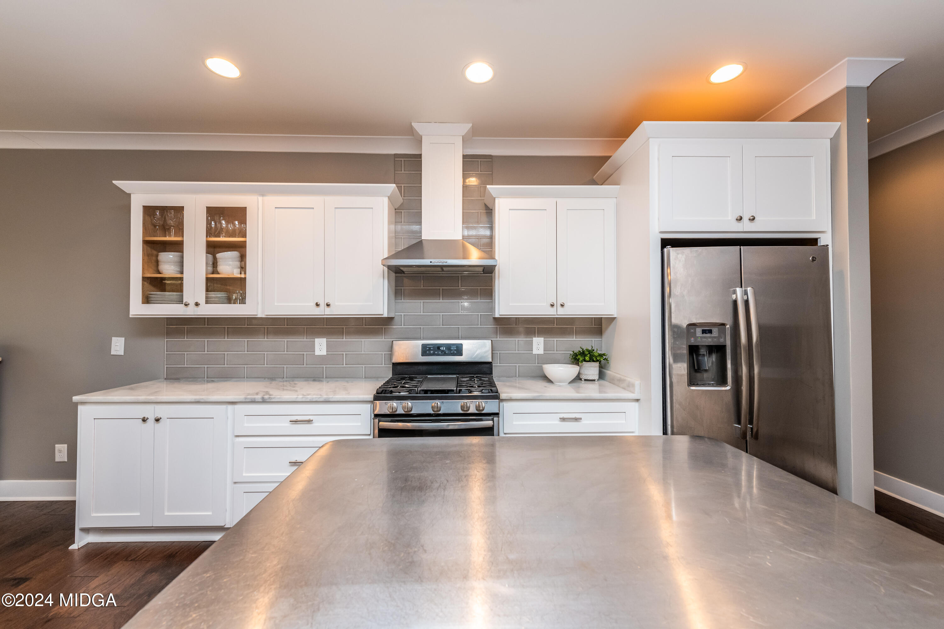 158 Harper Road Perry, GA 31069 - Photo 15 of 46 a kitchen with granite countertop a refrigerator stove and sink