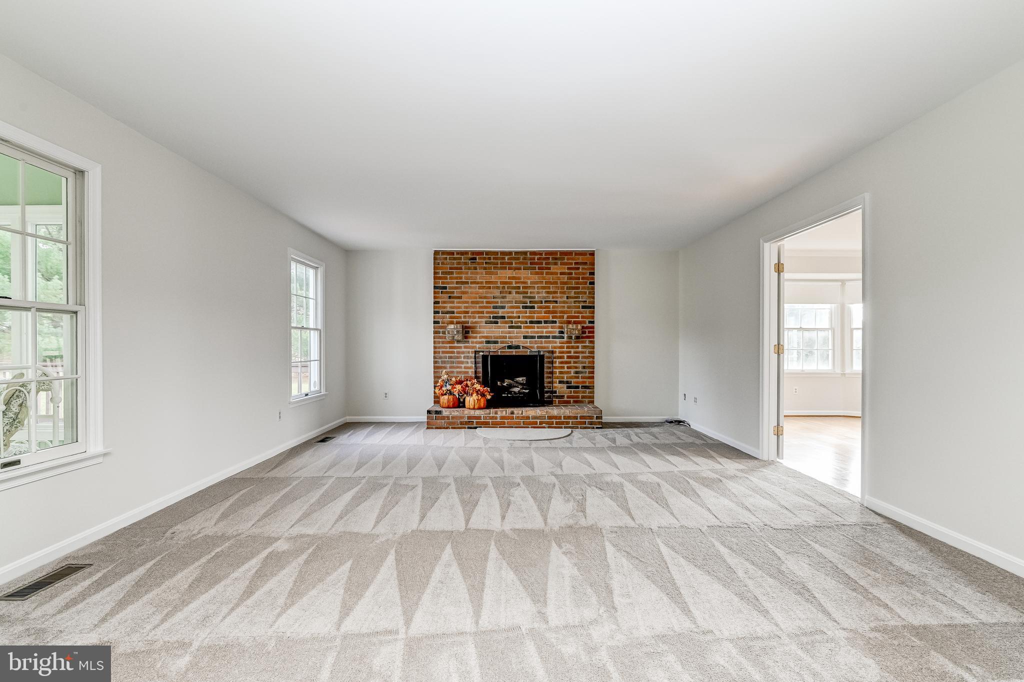 4739 Linthicum Road Dayton, MD 21036 - Photo 18 of 55 Family room with wood burning fireplace