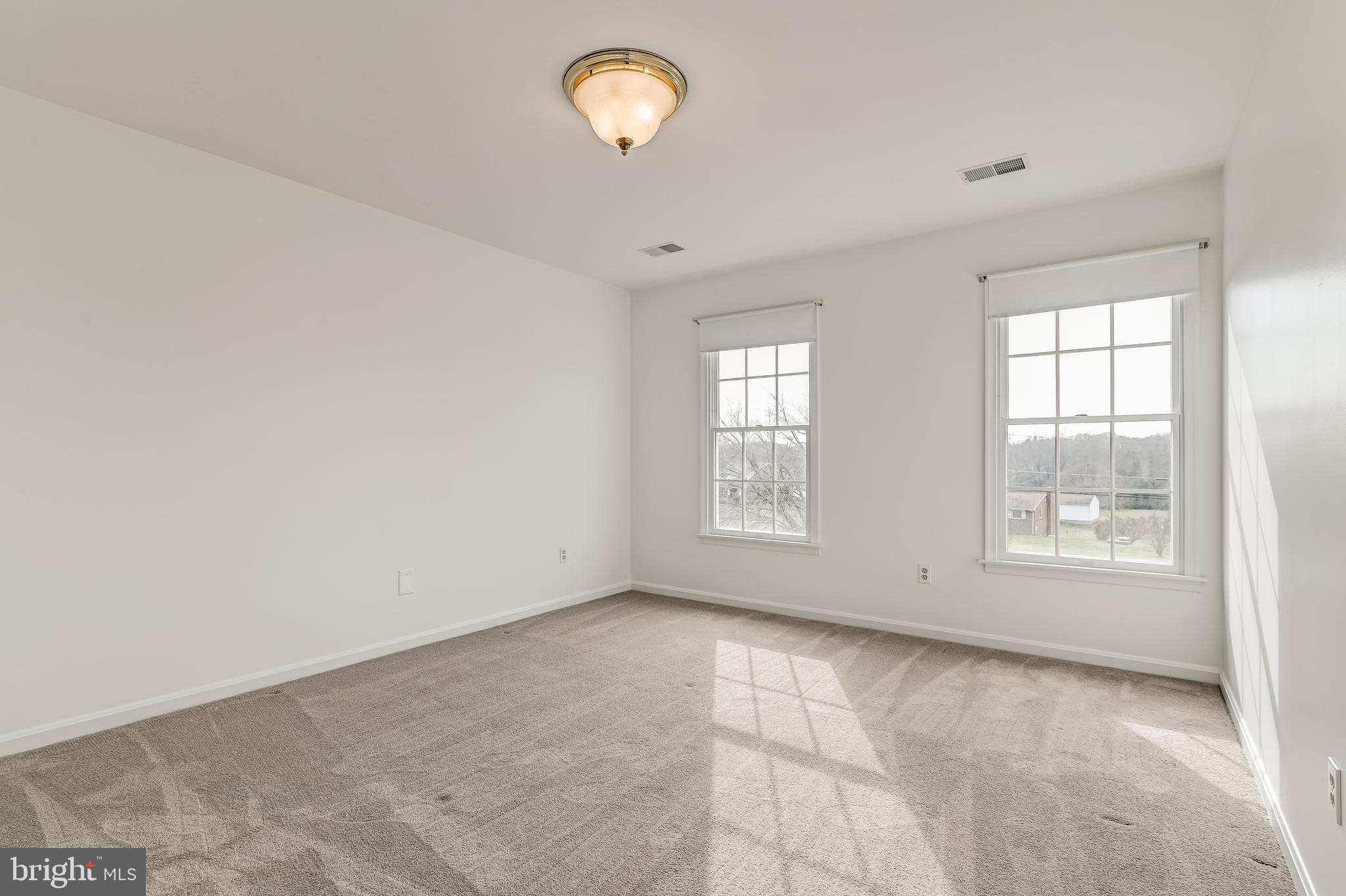 4739 Linthicum Road Dayton, MD 21036 - Photo 39 of 55 Bedroom with overhead lighting