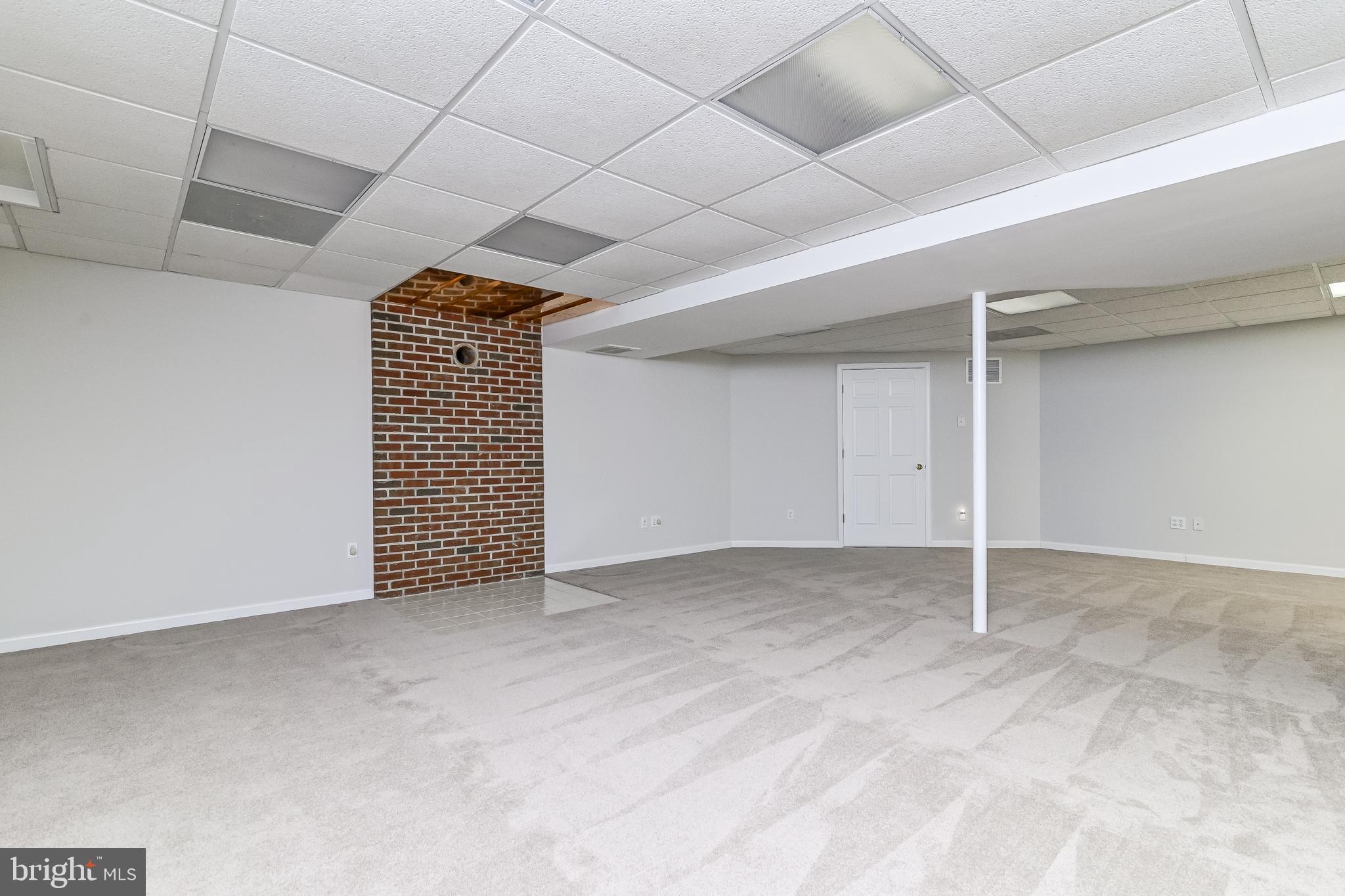 4739 Linthicum Road Dayton, MD 21036 - Photo 44 of 55 Lower level rec room w/rough-in for wood stove