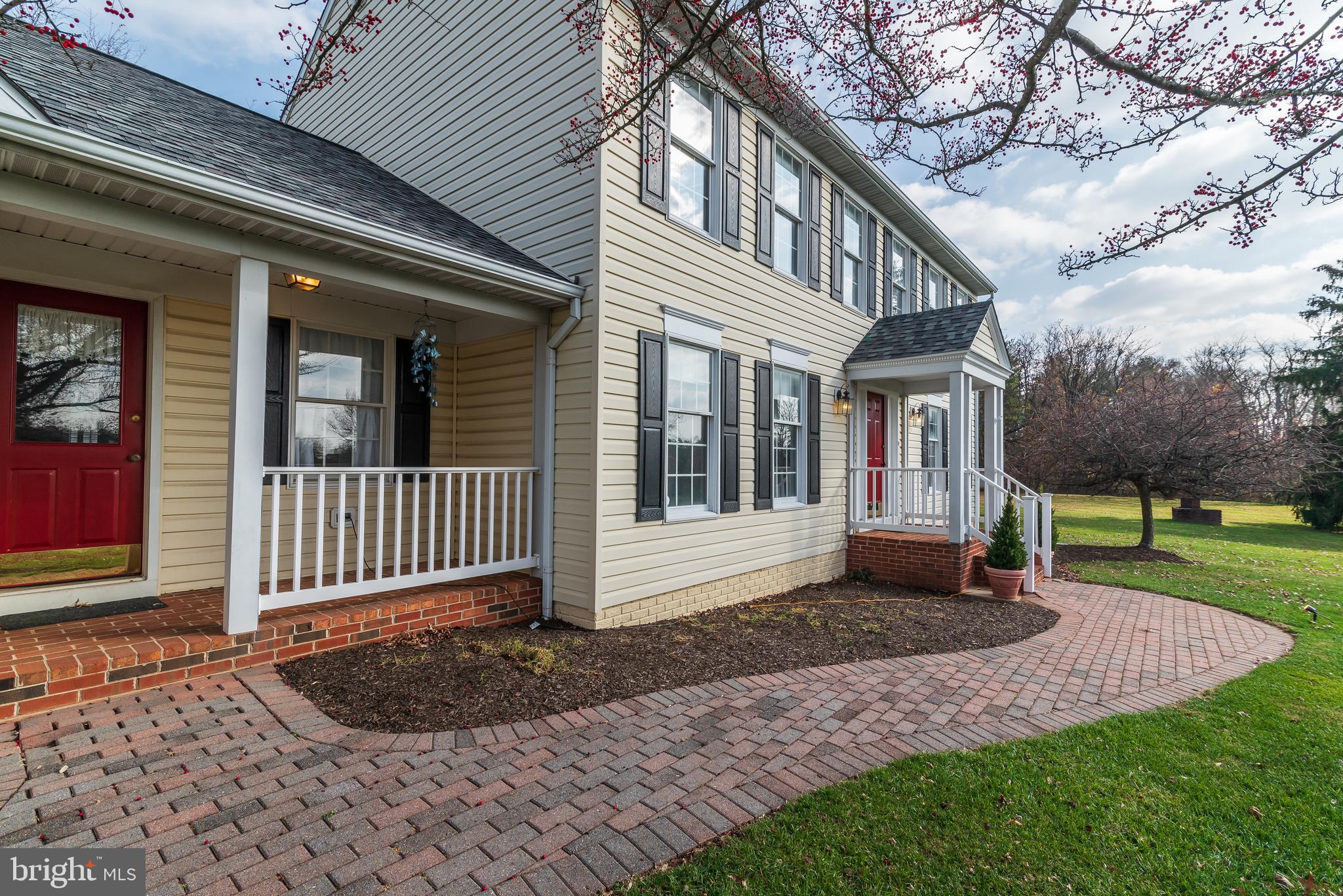 4739 Linthicum Road Dayton, MD 21036 - Photo 7 of 55 Covered service entry & paver walkway