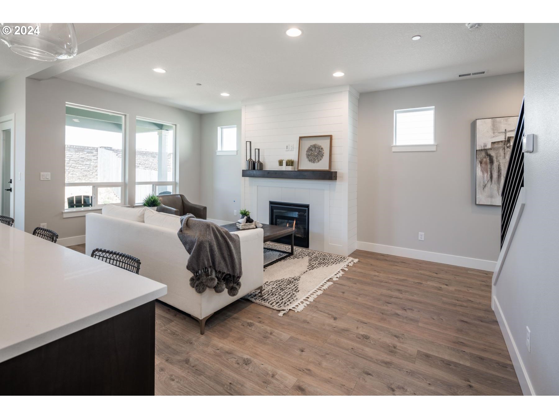 1017 South 46th Place Ridgefield, WA 98642 - Photo 12 of 23 a living room with furniture and a fireplace