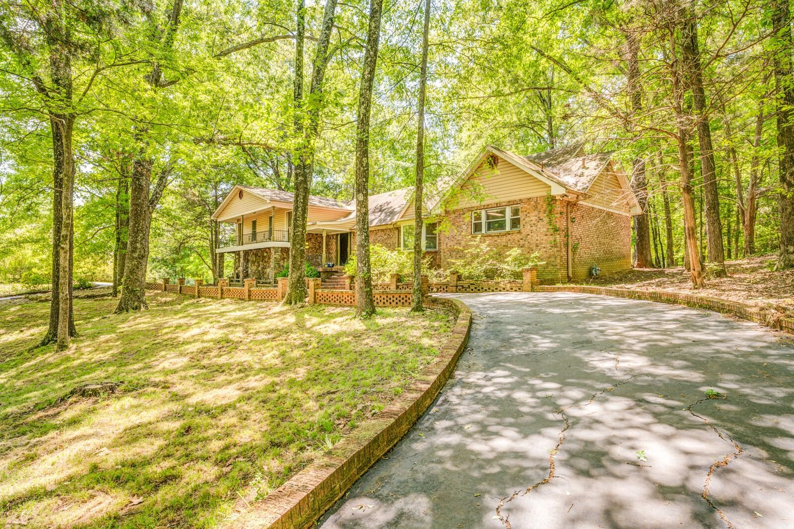 8651 Baylor Road Bartlett, TN 38002 - Photo 1 of 29 a view of residential houses with yard and trees