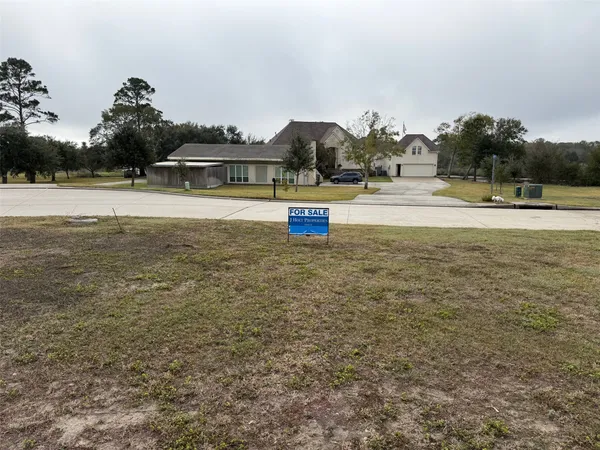 a view of swimming pool with an outdoor seating