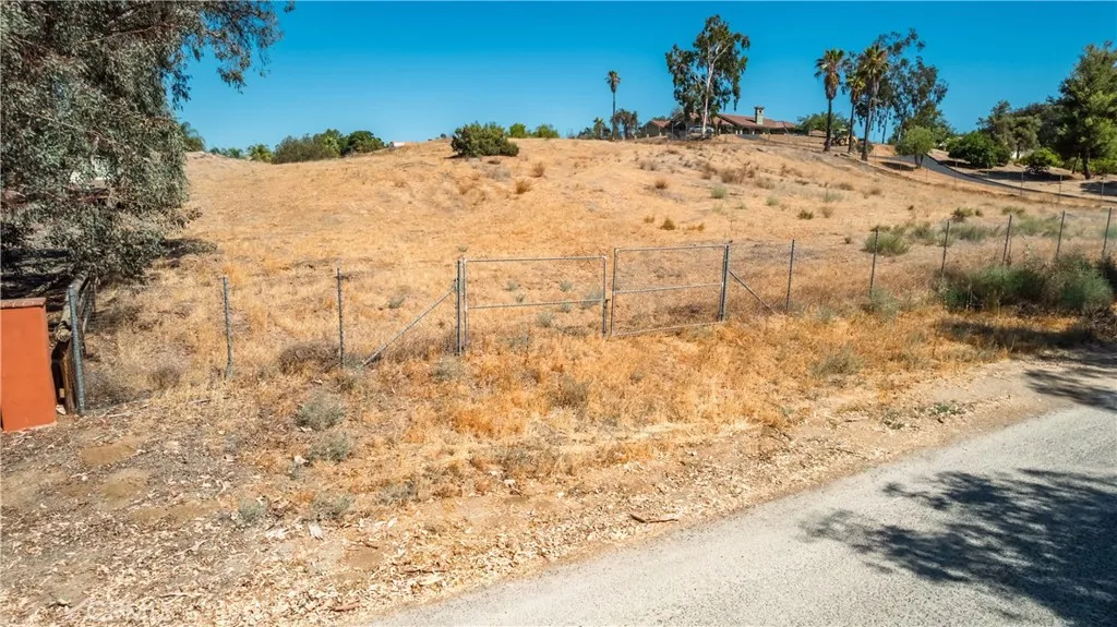 0 Halter Lane Riverside, CA 92504 - Photo 13 of 29 a view of a dry yard with wooden fence