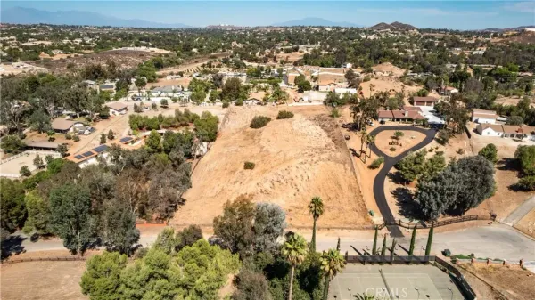an aerial view of residential house with outdoor space