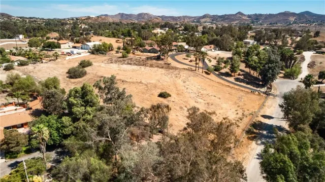 an aerial view of residential house with outdoor space