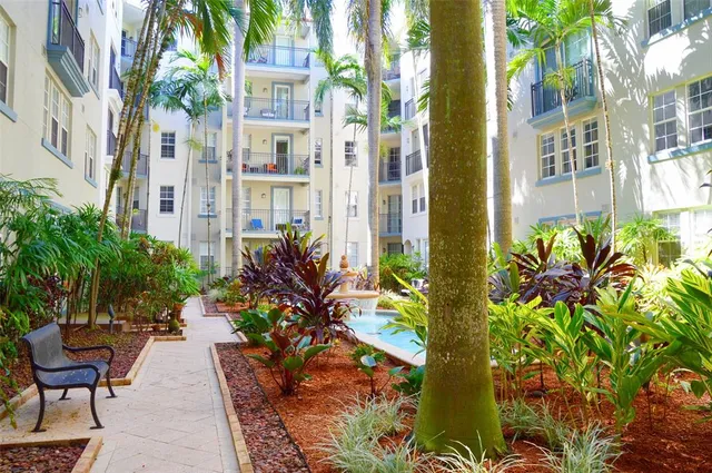 a view of a pathway both side of house