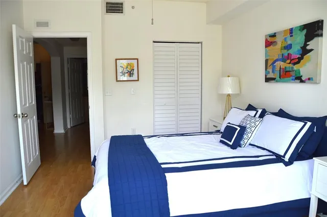 a view of kitchen and wooden floor