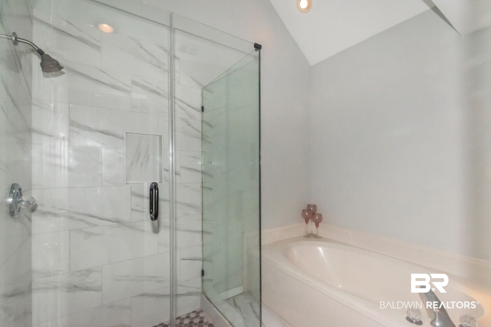 9991 Wedgefield Court Mobile, AL 36608 - Photo 17 of 30 Bathroom with lofted ceiling and plus walk in shower