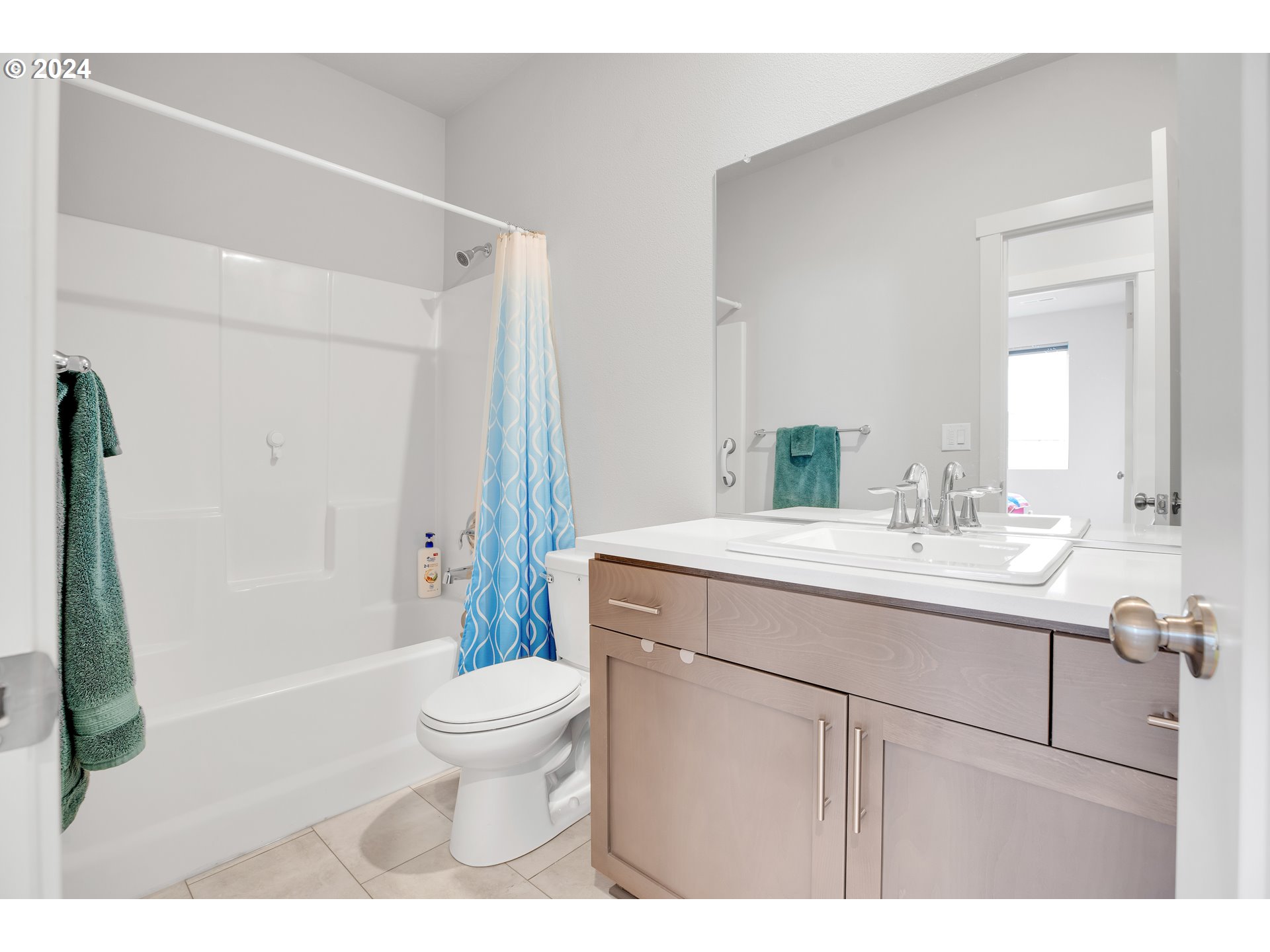 37332 Coho Street Sandy, OR 97055 - Photo 31 of 38 a bathroom with a granite countertop sink a toilet and shower
