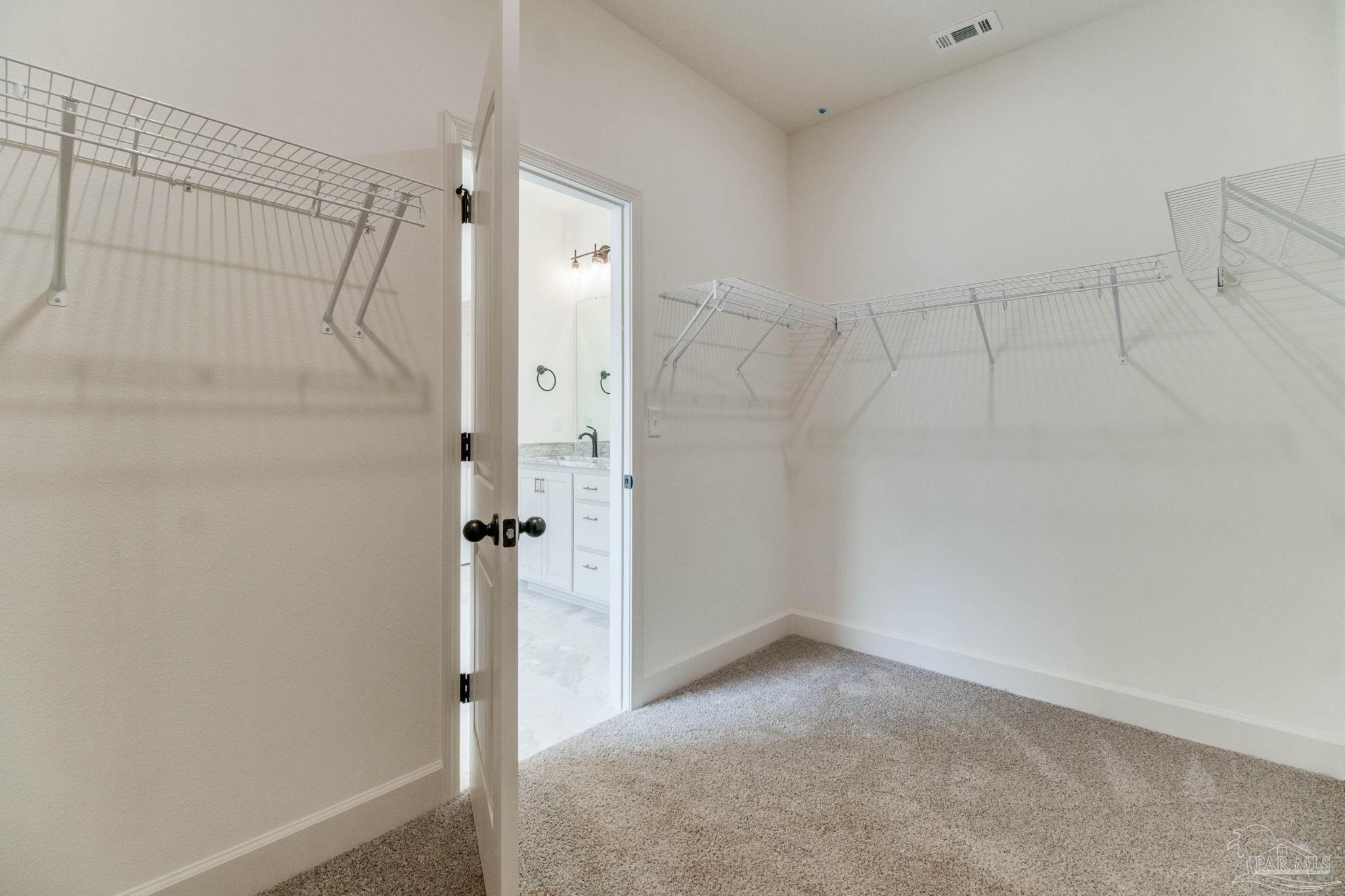 4310 Watkins Street Pace, FL 32571 - Photo 34 of 58 a bathroom with a shower
