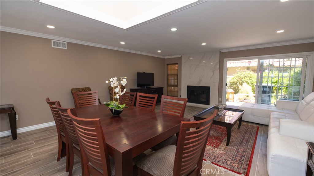 7 Satinwood Way Irvine, CA 92612 - Photo 9 of 15 a view of a dining room with furniture window and outside view