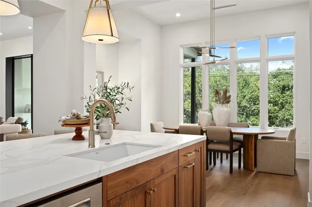 a bathroom with a bathtub and a sink