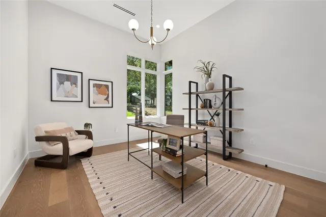 a bathroom with a shower sink and mirror