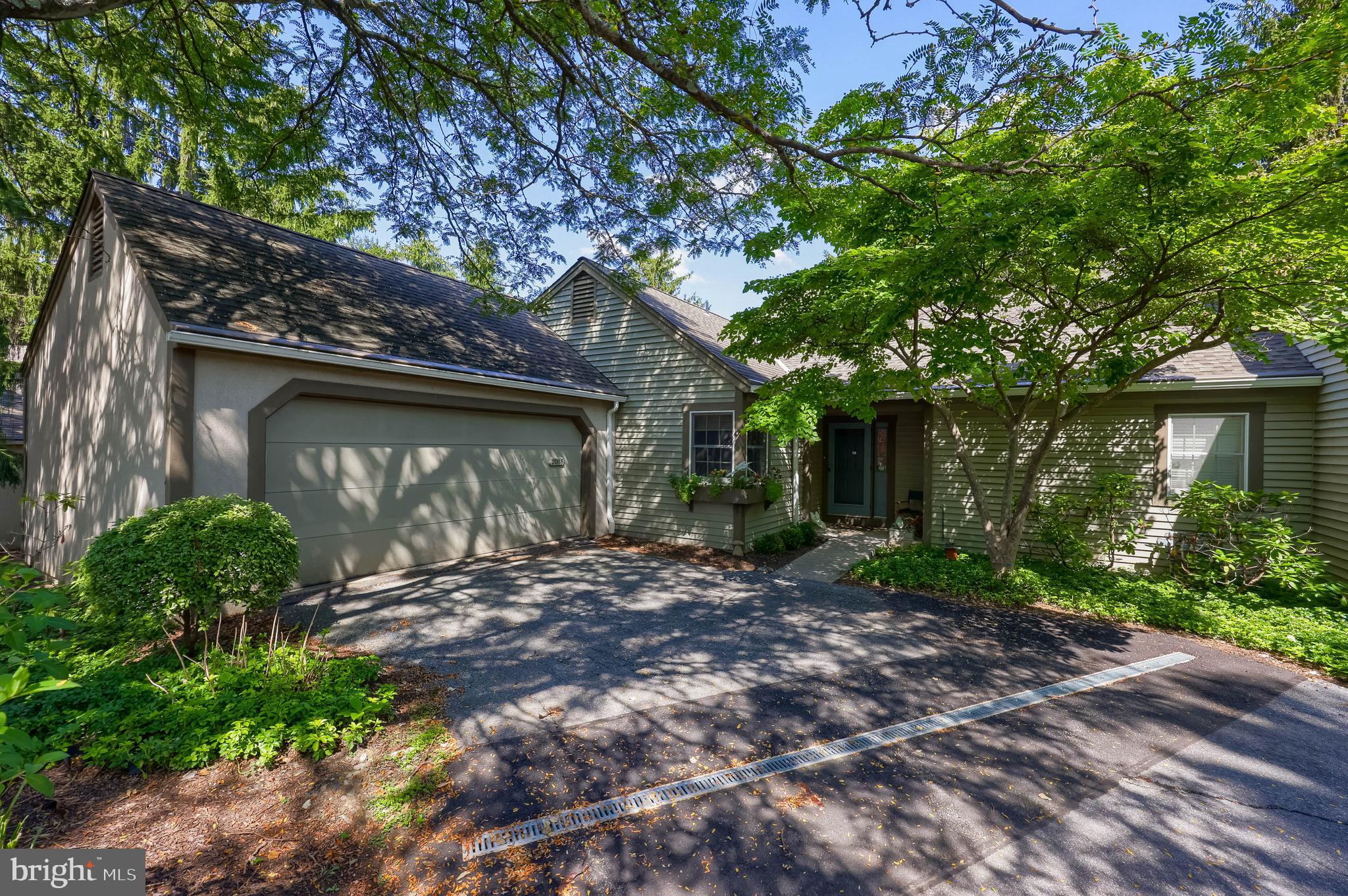 2018 Meadow Glen Reading, PA 19610 - Photo 1 of 46 a front view of a house with garden