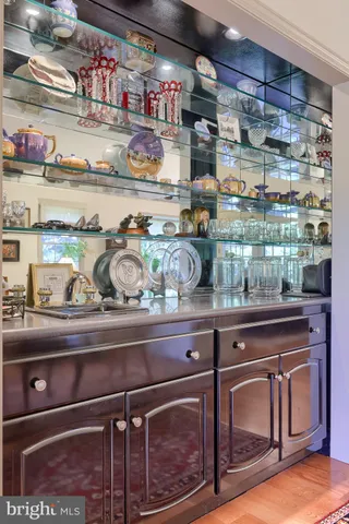 a kitchen with granite countertop lots of different kinds of food