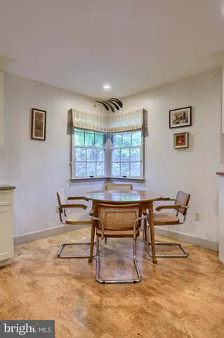 a view of a workspace with furniture